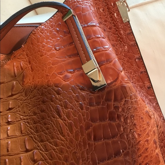 alligator grain cowhide purse. Rich caramel.
Lovely - Picture 6 of 8